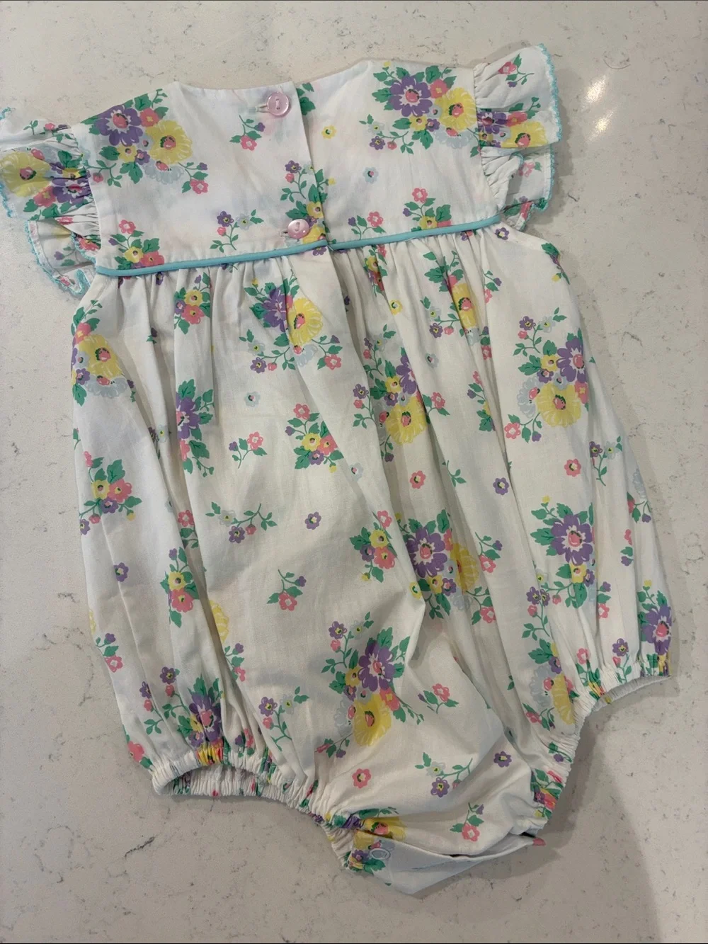 Floral Smocked Baby Romper - White with Yellow, Purple & Green Flowers